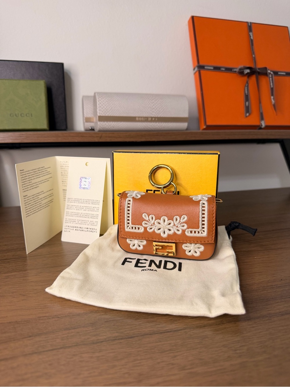 AUTHENTIC - Fendi Brown Leather Micro Bag with White Embroidered Floral Detail